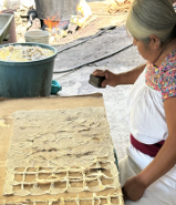 Woman making amate paper