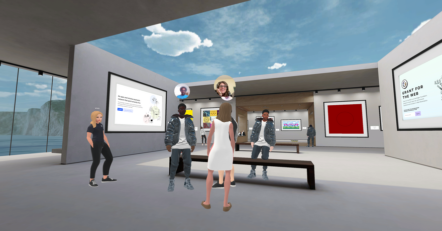 Erica, Adam, Micah and Wendy chatting in the virtual gallery in Spatial